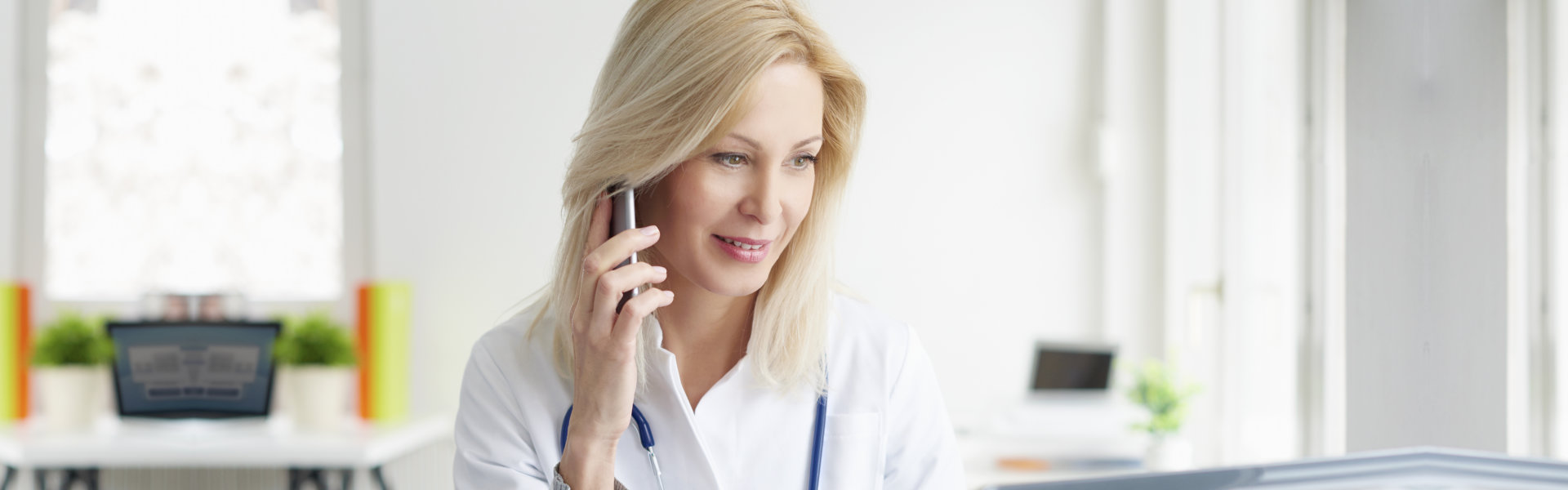 woman holding a phone